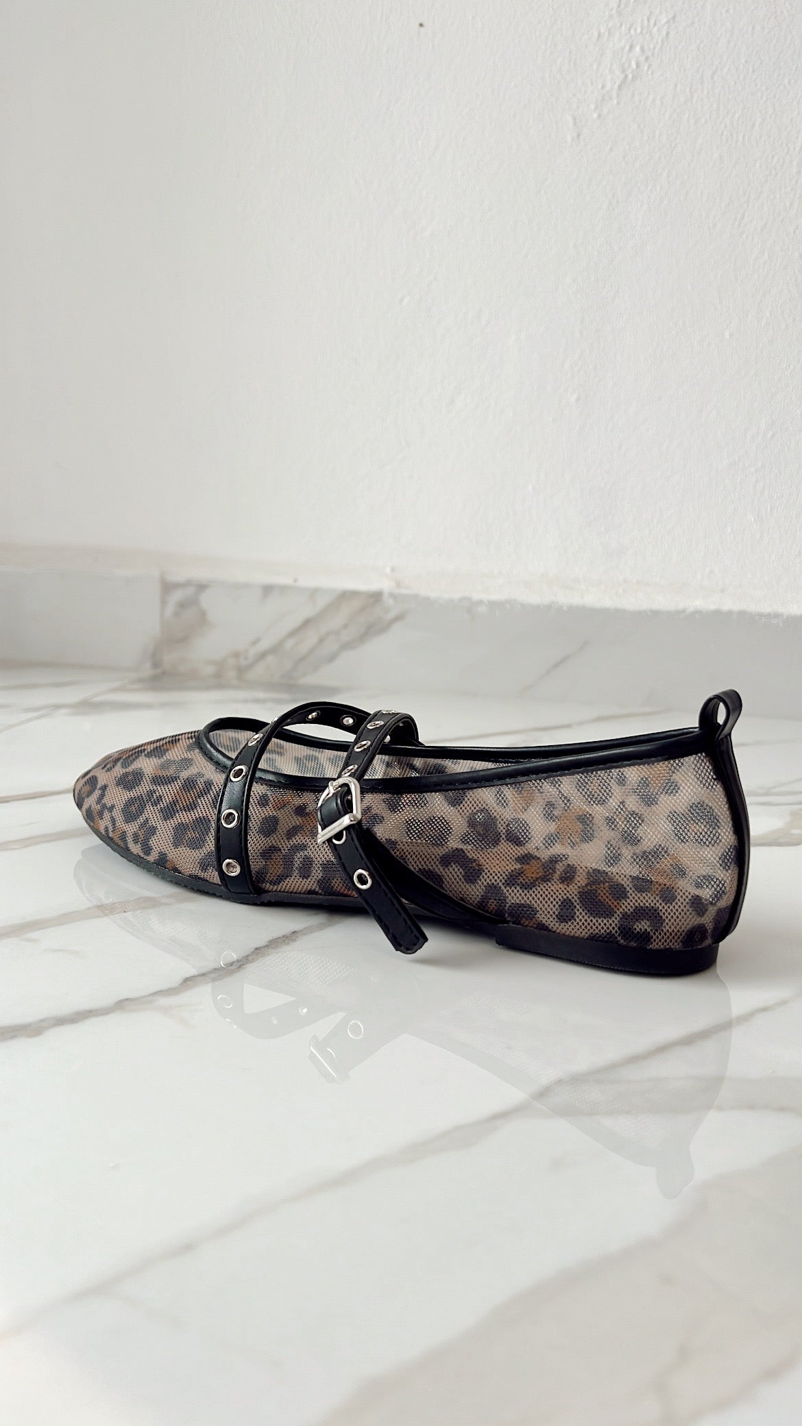 CORINA LEOPARDO